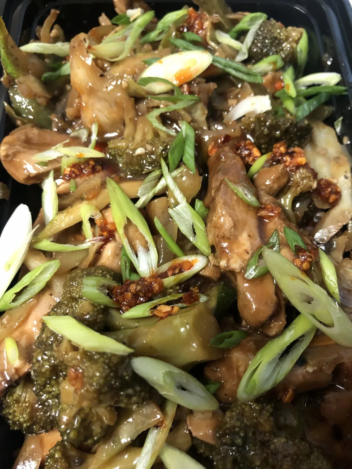 Chicken and broccoli meal prep with scallions