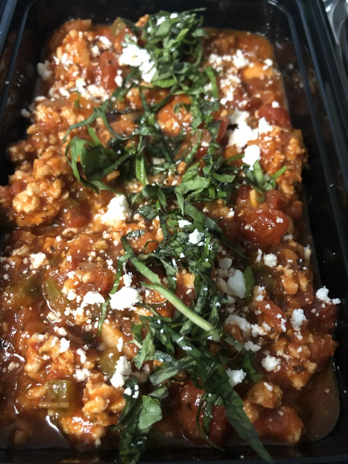 Tomato braised meal prep with herbs and cheese