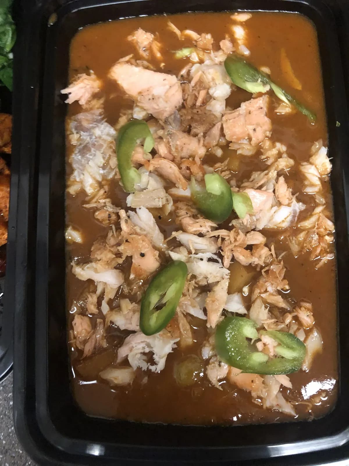 Savory meal prep with rice, jalapenos, and sauce