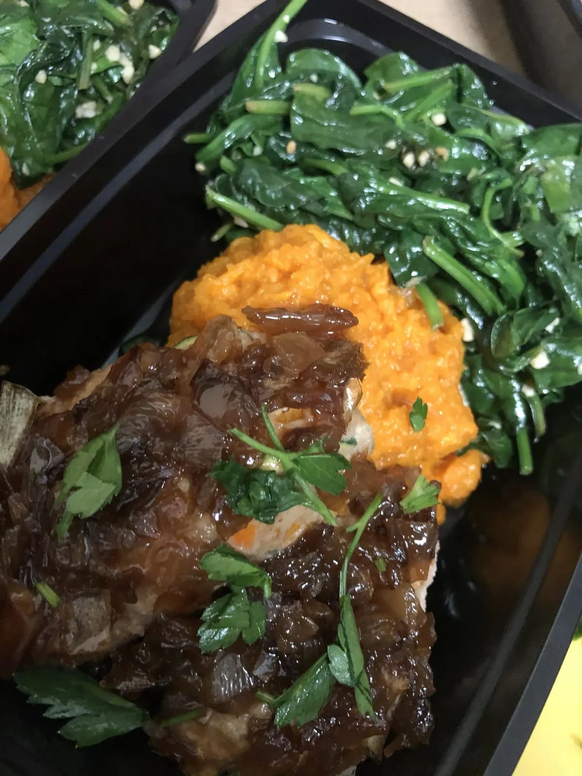 Composed plate with greens, mash, and braised meat